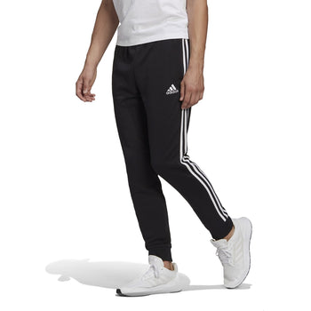 Pantaloni neri da uomo adidas Essentials French Terry Tapered Cuff 3-Stripes, Abbigliamento Sport, SKU a723000063, Immagine 0